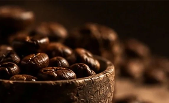 Bowl of roasted coffee beans
